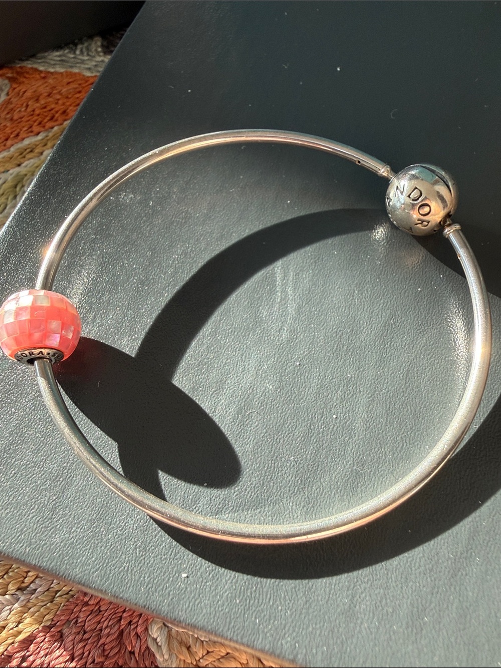 Pandora Essence (retired) Sterling Bracelet with Coral Pink Faceted Charm